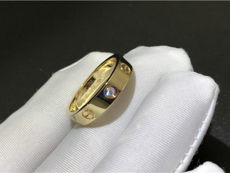 Custom LOVE wedding ring, set with 1 diamond 18K gold