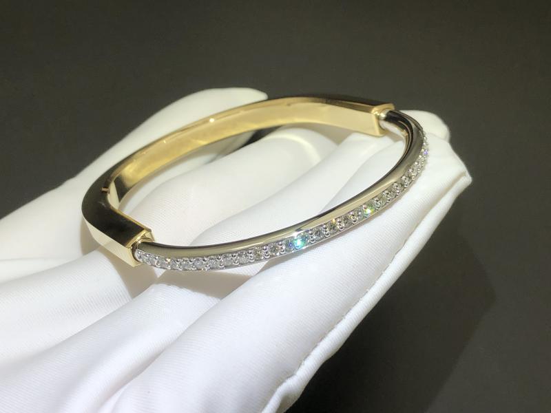 Gold and 18K white gold half pavé diamonds