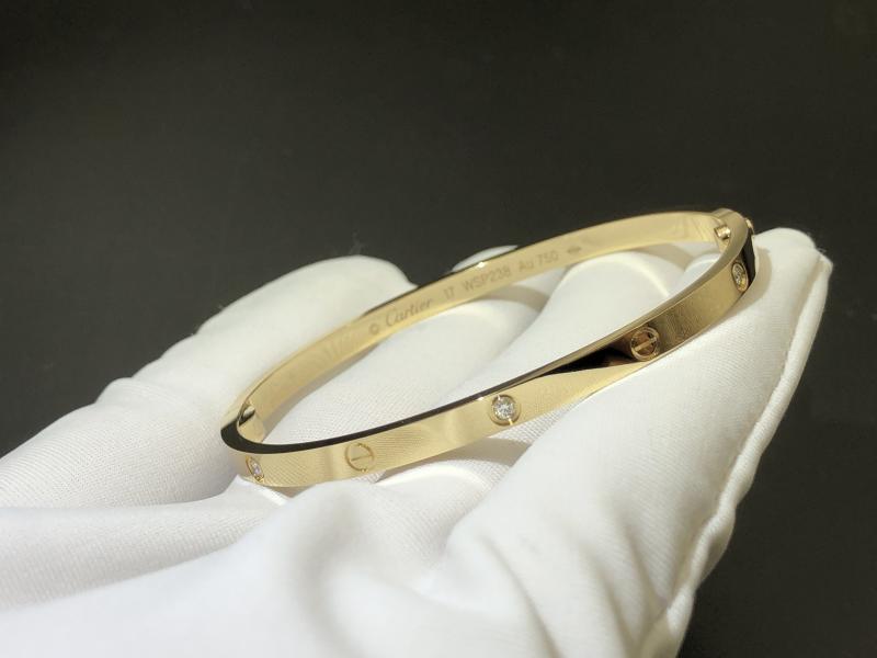 LOVE bracelet, small size, set with 6 diamonds, 18K gold