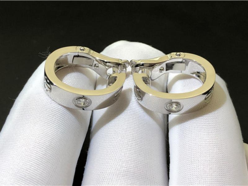  LOVE earrings set in 2 diamonds 18K white gold